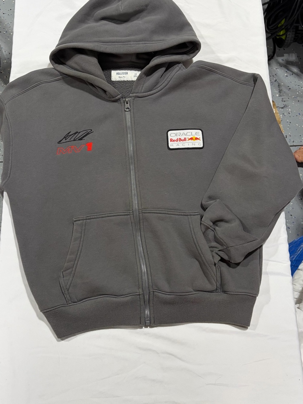 Hollister Kids Charcoal Zip Hoodie with Racing Patch Accents